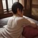 陈明远医生头像，男性妇产科与性医学顾问，戴眼镜，专业稳重形象